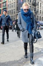 DAKOTA FANNING in Leather Pant Out and About in New York