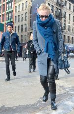 DAKOTA FANNING in Leather Pant Out and About in New York