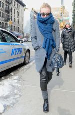 DAKOTA FANNING in Leather Pant Out and About in New York