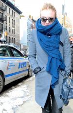 DAKOTA FANNING in Leather Pant Out and About in New York