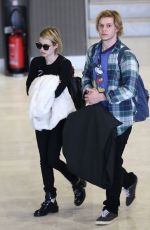 EMMA ROBERTS at Charles De Gaulle Airport in Paris