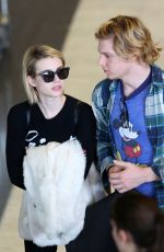 EMMA ROBERTS at Charles De Gaulle Airport in Paris
