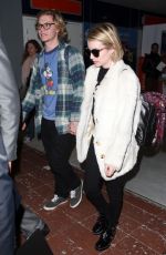 EMMA ROBERTS at Charles De Gaulle Airport in Paris