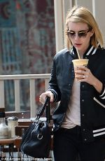 EMMA ROBERTS leaves Le Pain Cafe in Los Angeles