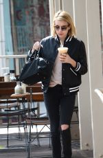 EMMA ROBERTS leaves Le Pain Cafe in Los Angeles