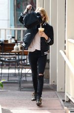 EMMA ROBERTS leaves Le Pain Cafe in Los Angeles