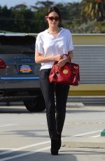 EMMY ROSSUM Leaves a Veterinary Clinic in Los Angeles