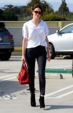 EMMY ROSSUM Leaves a Veterinary Clinic in Los Angeles