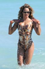 JENNIFER NICOLE LEE at a Photshoot on the Beach in Miami