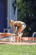 JOANNA KRUPA in Black Bikini at Pool in Miami