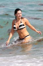 KELLY BROOK in Striped Bikini on the Beach In Miami