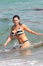KELLY BROOK in Striped Bikini on the Beach In Miami