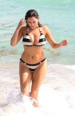 KELLY BROOK in Striped Bikini on the Beach In Miami