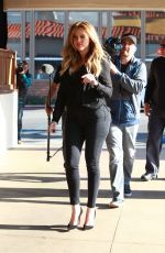 KIM< KOURTHEY and KHLOE KARDASHIAN on the Set of Keep Up With the Kardashians