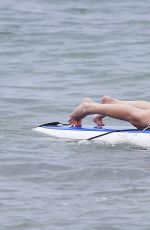 LEANN RIMES in Bikini Bottoms Trying to Paddleboarding in Mexico
