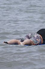 LEANN RIMES in Bikini Bottoms Trying to Paddleboarding in Mexico