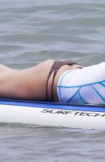 LEANN RIMES in Bikini Bottoms Trying to Paddleboarding in Mexico