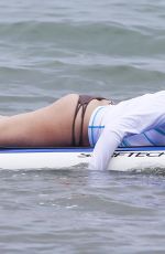 LEANN RIMES in Bikini Bottoms Trying to Paddleboarding in Mexico