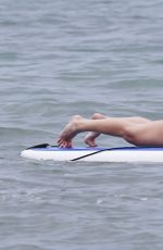 LEANN RIMES in Bikini Bottoms Trying to Paddleboarding in Mexico