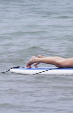 LEANN RIMES in Bikini Bottoms Trying to Paddleboarding in Mexico