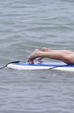 LEANN RIMES in Bikini Bottoms Trying to Paddleboarding in Mexico