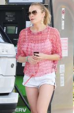 LEANN RIMES in Shorts at a Gas Station in Los Angeles