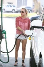 LEANN RIMES in Shorts at a Gas Station in Los Angeles