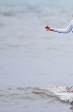 LEANN RIMES Taking Paddleboarding Lesson in Hawaii