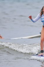 LEANN RIMES Taking Paddleboarding Lesson in Hawaii