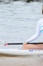 LEANN RIMES Taking Paddleboarding Lesson in Hawaii