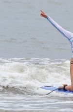 LEANN RIMES Taking Paddleboarding Lesson in Hawaii
