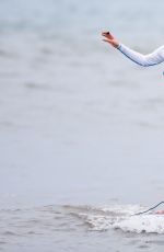 LEANN RIMES Taking Paddleboarding Lesson in Hawaii