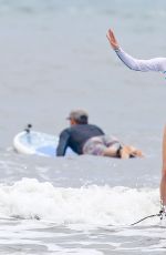 LEANN RIMES Taking Paddleboarding Lesson in Hawaii