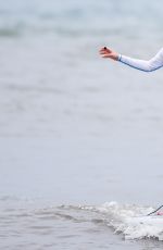 LEANN RIMES Taking Paddleboarding Lesson in Hawaii