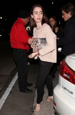 LILY COLLINS Arrives at Craig
