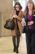 LILY COLLINS at LAX Airport in Los Angeles