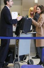 LILY COLLINS at LAX Airport in Los Angeles