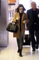 LILY COLLINS at LAX Airport in Los Angeles