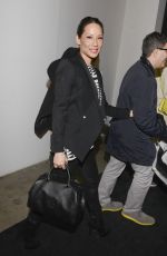 LUCY LIU at Edun Fashion Show in New York
