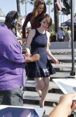 MARIA MENOUNOS and MICHELLE DOCKERY on the Set of Extra at Universal City