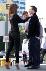 MARIA MENOUNOS and MICHELLE DOCKERY on the Set of Extra at Universal City