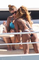 MELANIE BROWN and Friends in Bikini at a Yacht in Sydney