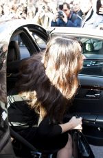 MONICA BELLUCCI Arrives at Dolce & Gabbana Fashion Show in Milan