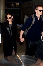 OLIVIA MUNN and Joel Kinnaman at LAX Airport