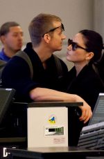 OLIVIA MUNN and Joel Kinnaman at LAX Airport