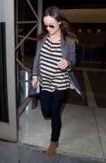 OLIVIA WILDE Arrives at LAX  Airport in Los Angeles