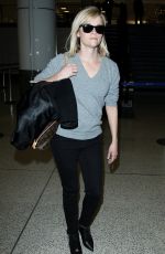 REESE WITHERSPOON Walks Through LAX Airport