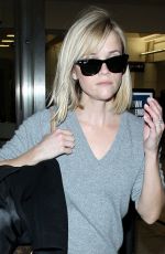 REESE WITHERSPOON Walks Through LAX Airport
