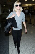 REESE WITHERSPOON Walks Through LAX Airport
