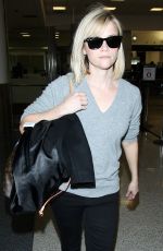 REESE WITHERSPOON Walks Through LAX Airport